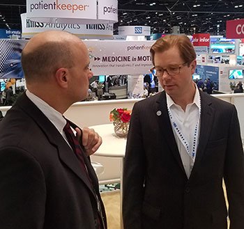 Tony with Greg Dorn (right), CEO of Hearst Health